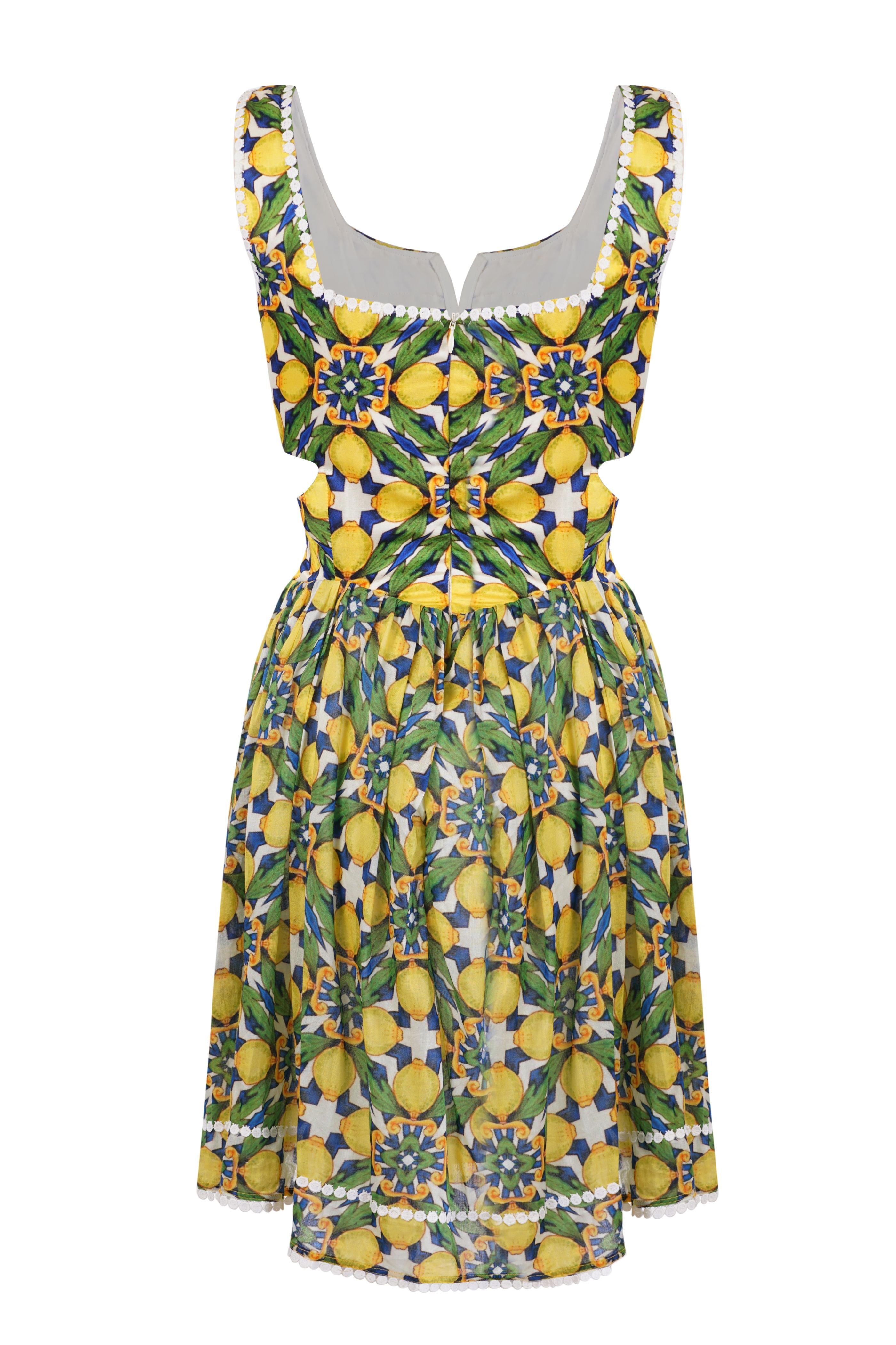 Designer, sustainable Amalfi beachwear dress for women without sleeves, white lace, V neckline, cut outs at the waist, back zip closure and mid length flared skirt. Perfect for layering over or covering a swimwear and for resort style looks.