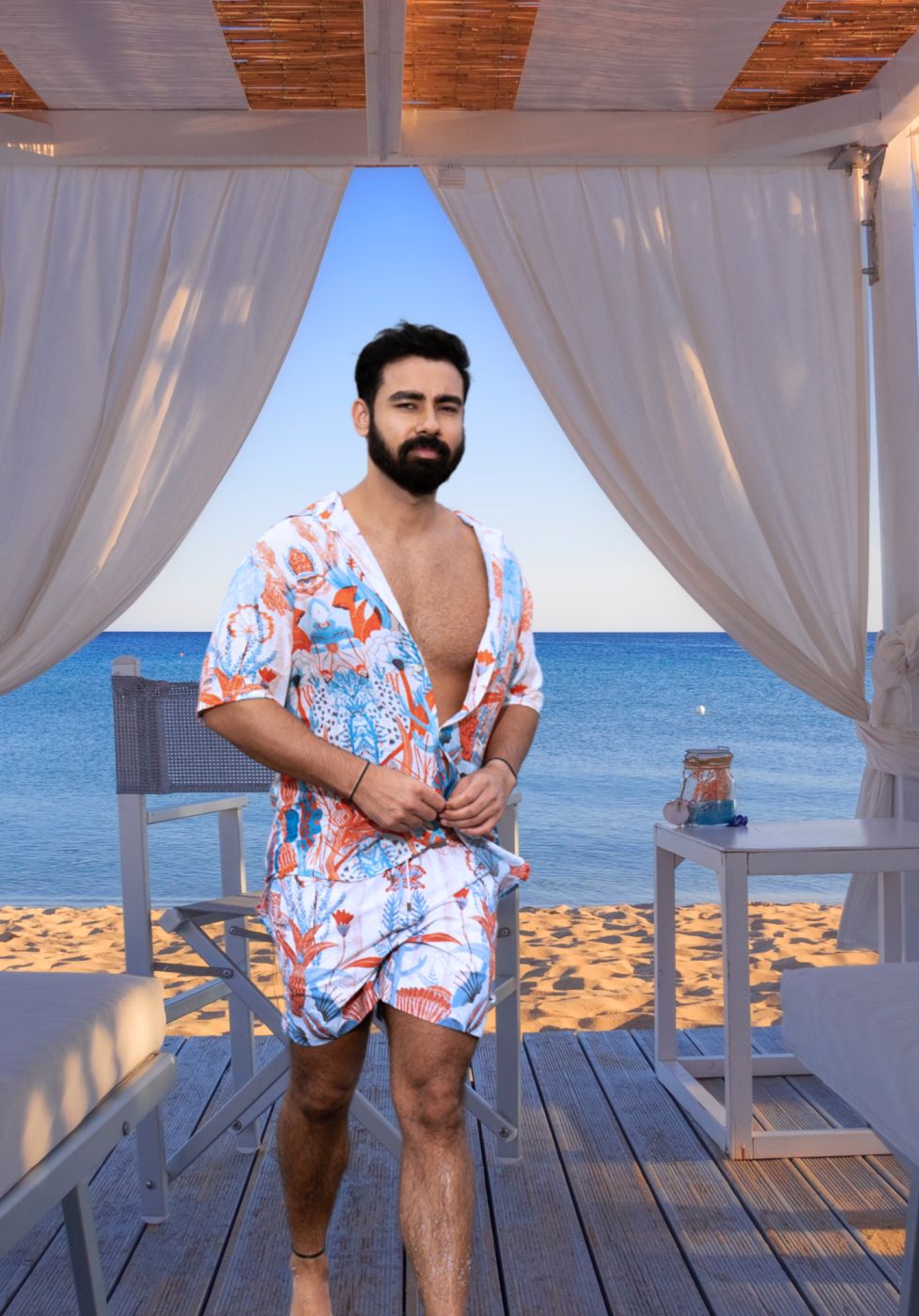 Designer Firenze shorts for men in artistic coral printed sustainable fabric, elastic waistband, adjustable drawstring ,plus sizes and matching family set. Comfortable swimwear shorts for kids.