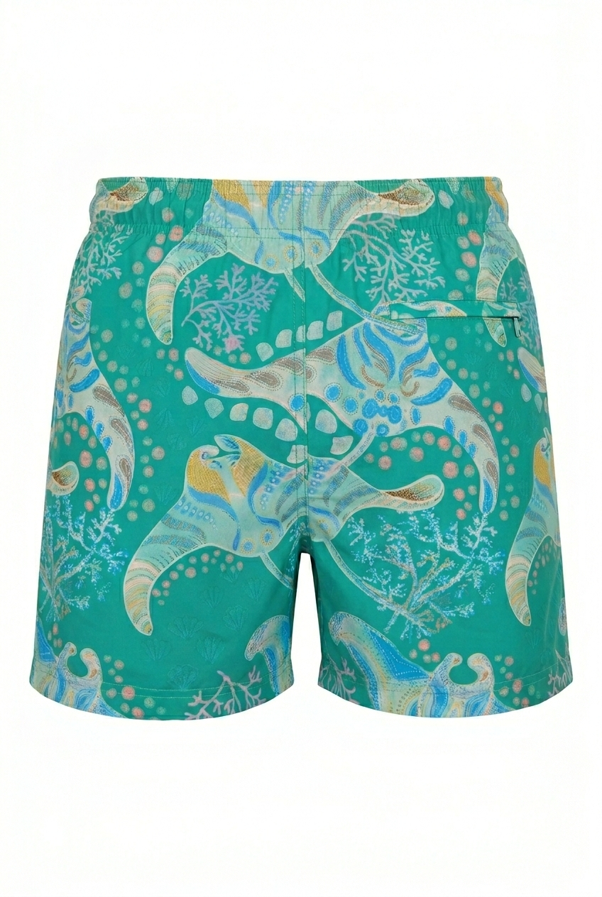 Designer Tribal Manta board shorts for men in green and blue oceanic tones, adjustable drawstring, quick-dry fabric, customized fit & plus sizes. Comfortable swimwear for summer getaways.