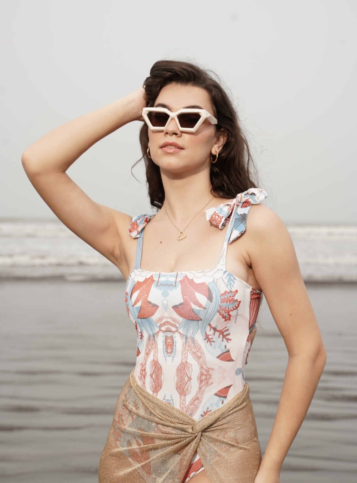 Designer Firenze monokini for women in  tropical printed sustainable fabric, square neck line, shoulder ties, back clasp, custom fit and plus sizes. Sexy swimwear for stylish summer looks.