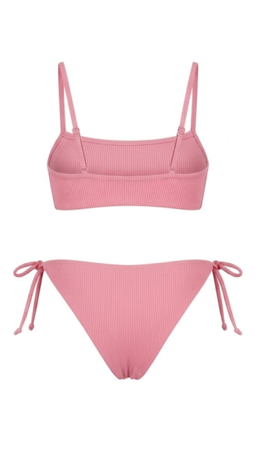 Designer Kaia bikini set swimwear in pink, burgundy and blue ribbed fabric with square neck top, low waist tie side bottoms and plus sizes. Stylish swimwear for sexy summer looks.