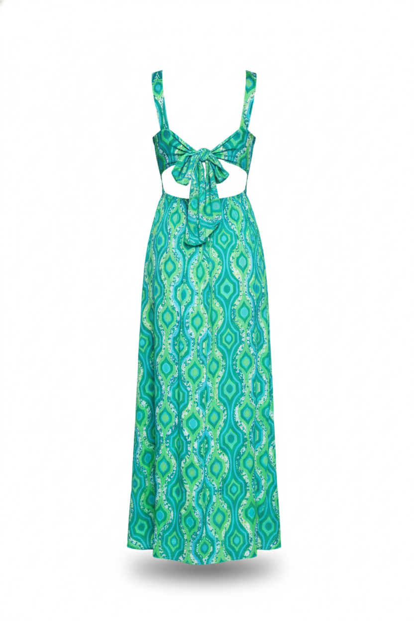 Designer Marine Meadows Maxi Dress for women in green satin fabric with side cut outs, V neckline, a knot at the center, cinched waist and flowing skirt with a ruffled hem along the edges. Stylish women beachwear and resort wear.