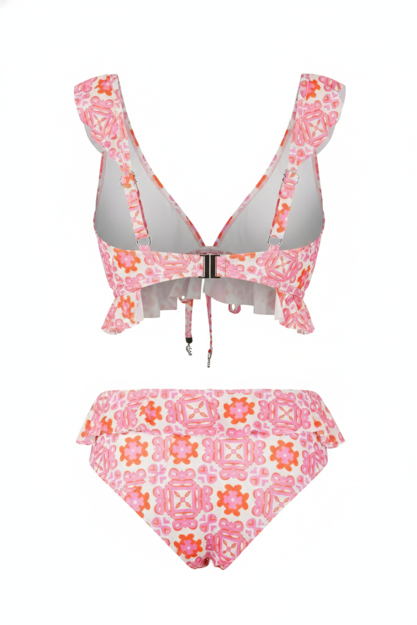 Women’s printed bikini set with V-neck ruffle top and high-waist flounce bottom in pink and orange geometric print, perfect for beach, pool, or tropical vacations.