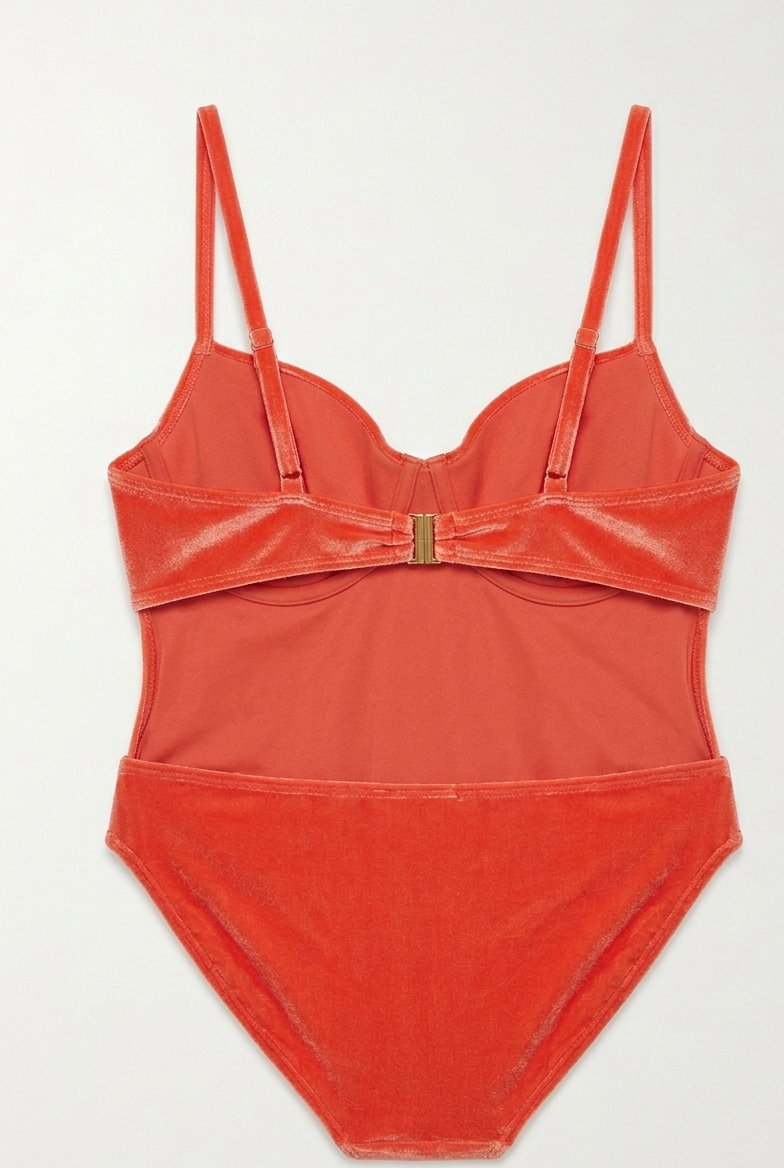 Starfire monokini for women, a one piece swimsuit with a cut-out design in orange, purple, and navy blue, perfect for stylish beachwear.