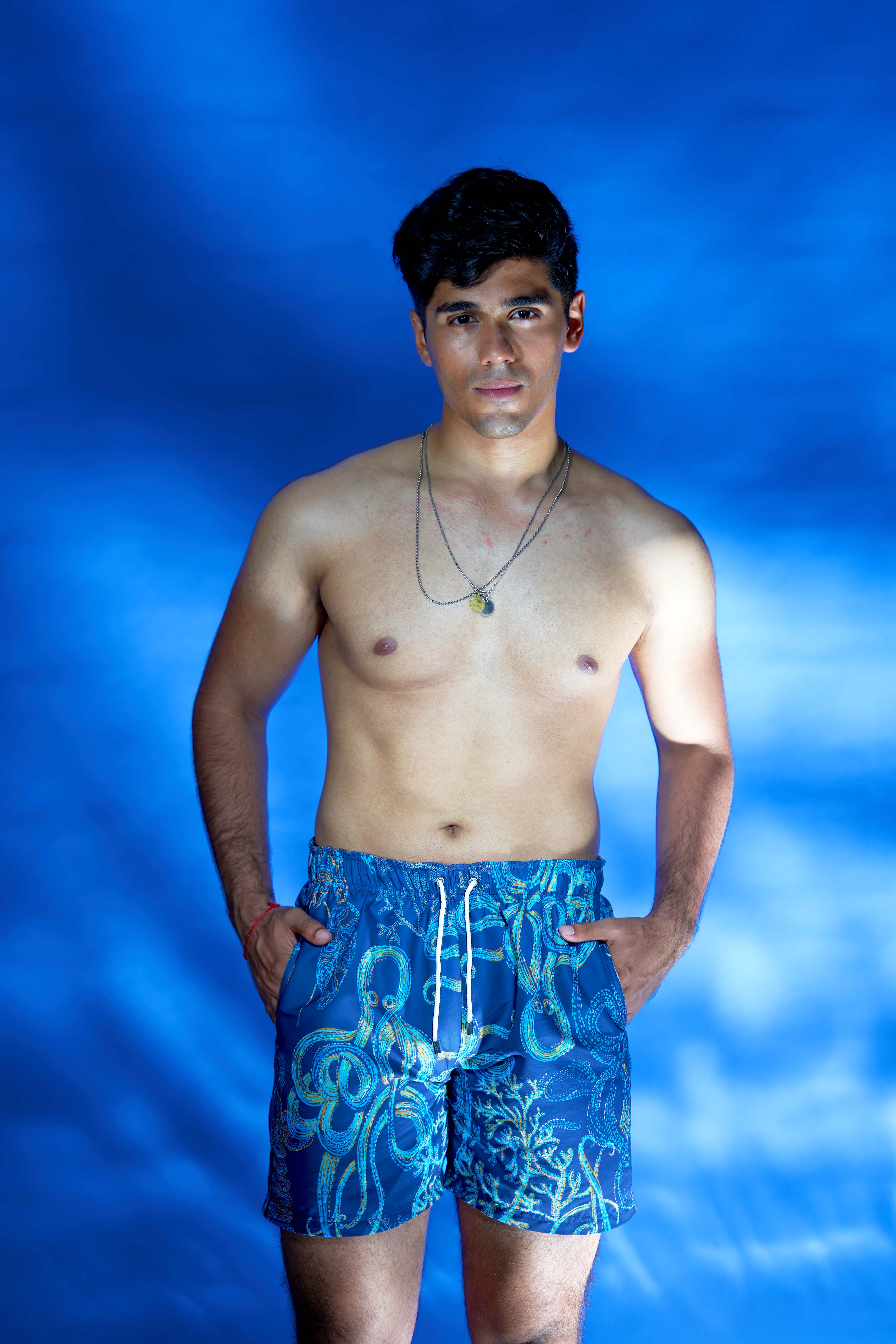 Designer, sustainable octopus print Tentacle Trance Men's blue board shorts swimwear in quick-dry fabric, UV protection, custom fit and plus sizes.