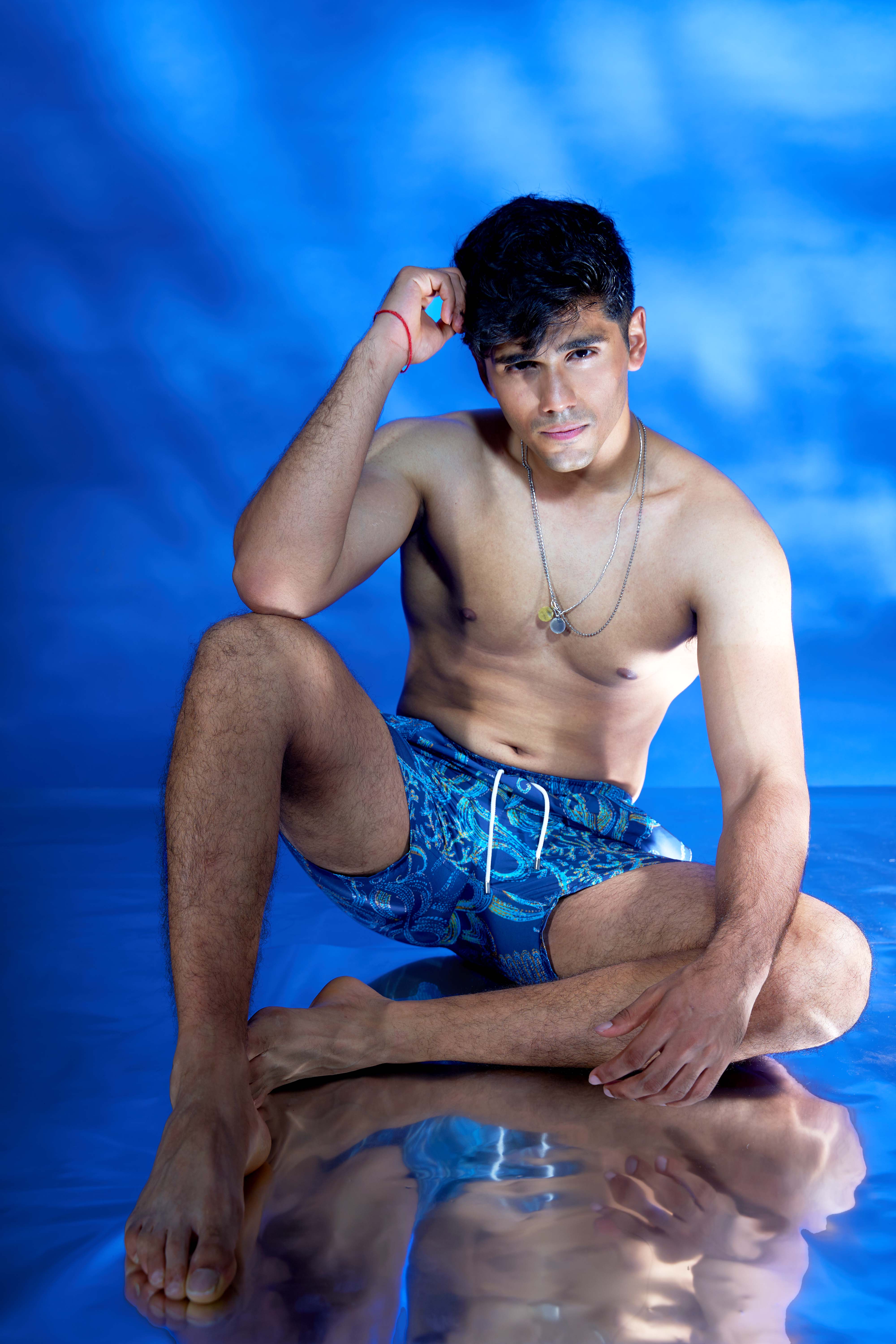 Designer, sustainable octopus print Tentacle Trance Men's blue board shorts swimwear in quick-dry fabric, UV protection, custom fit and plus sizes.