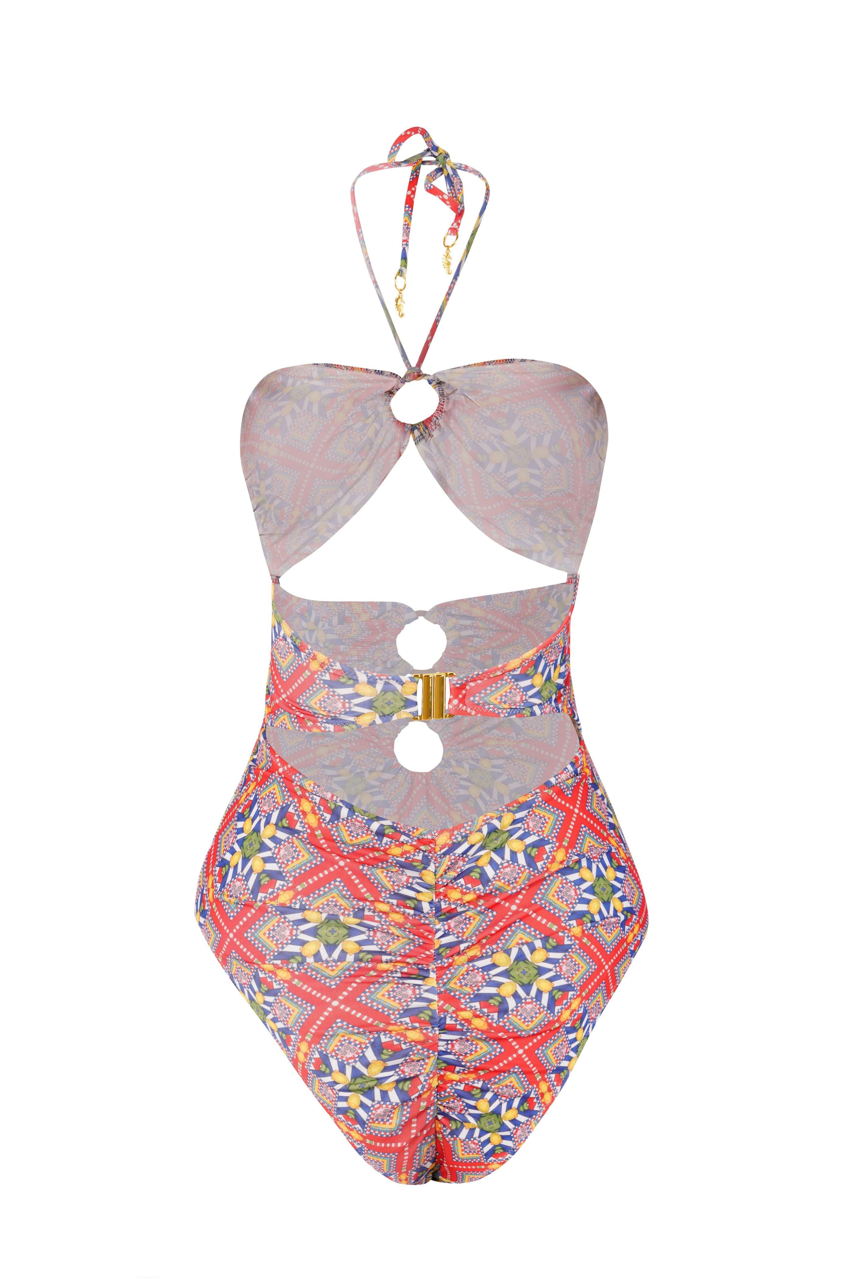 Designer Tuscany monokini swimsuit for women in red geometric print, stylish cut-outs, halter neck tie, gold rings, high waist bottom with regular butt coverage and a back clasp for a secured fit.